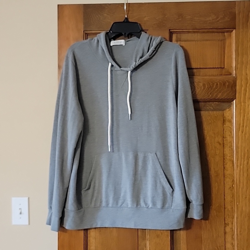 Green hooded top